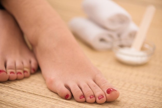 closeup-photo-female-feet-spa-salon-pedicure-manicure-procedure_530697-3447.jpg